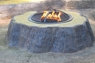Custom fire pits tree stump in Madison Wisconsin